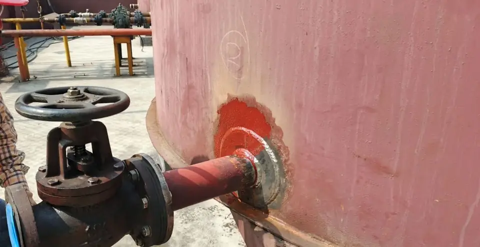 Outlet valve fitted to a new tank nozzle